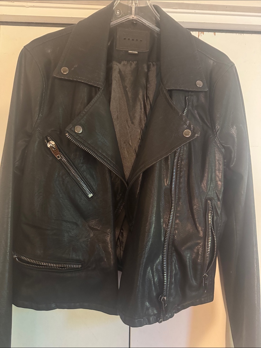 Black faux leather jacket moto style
